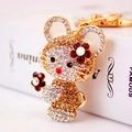 Sparkling rhinestone mouse keychain in gold and silver finish with flower accent - 11.6x4cm / Gold