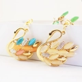 Charming swan keychain with opal style stones and rhinestones on golden metal base - 6.1*6 / Random Color