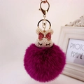 Porte-clés lapin en fourrure synthétique magenta avec tête en perles pour sac - Fuchsia