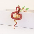 Portachiavi a forma di serpente dorato con strass rosa e dettagli lucidi - Confezione singola in busta OPP / Rosa