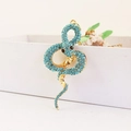 Squisito portachiavi a forma di serpente dorato con strass azzurri in forma a S - Confezione singola in busta OPP / Blu