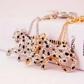 Sparkling crystal leopard keychain in gold and silver finish for women's bag accessories - Random Color