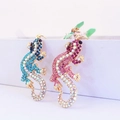 Porte-clés gecko scintillants avec strass bleus et roses et finition plaquée or chic - Couleur Aléatoire