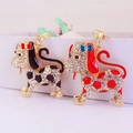Cute enamel spotted dog keychain with sparkling crystals and gold metal hooks for handbags - Random Color