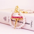 Elegante portachiavi ballerina con strass rosa e perle bianche su finitura dorata - Imballaggio Individuale / Ballerina Dorata (Colore dell'immagine)