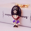 Royal guard keychain with purple enamel and gold star crystal for bags and car keys - Random Color / Purple