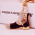 Sparkling crystal rhinestone boot keychain with black enamel and gold finish on book - Black