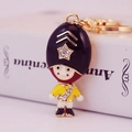 Creative Royal Guard keychain with sparkling crystal embellishments and enamel finish - Random Color / Yellow