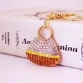 Portachiavi borsa dorata con cristalli ambra e strisce di smalto giallo brillante - Oro