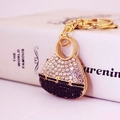 Sparkling crystal handbag keychain with black and white rhinestones on a gold base - Black