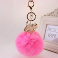 Cute pink faux fur pom-pom keychain featuring a crystal swan charm with gold lobster clasp - Individual Packaging / White + Pink Pom