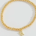Golden beaded bracelet with a minimalist capital letter H pendant for a stylish look - Letter H