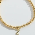 Minimalist gold beaded bracelet featuring a polished capital Z letter pendant for women - Letter Z