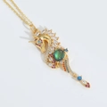 Collana con pendente a cavalluccio marino unicorno dorato con zirconi e occhio di gatto - Verde (Oro)