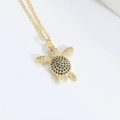 Golden turtle pendant necklace featuring black and white zircon stones on an O-chain - Tortoise (Gold)