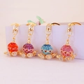 Sparkly pumpkin carriage keychain set in gold-plated alloy with colorful rhinestones - Individual Packaging / Random Color
