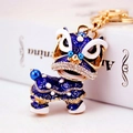 Portachiavi con danza del leone cinese in smalto blu e strass luccicanti - Blu