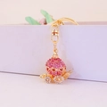Portachiavi carrozza zucca dorata con strass rosa e dettagli a cuore - Imballaggio Individuale / Rosa