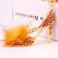 Porte-clés talon haut doré avec strass marron et grand pompon en fausse fourrure - Or