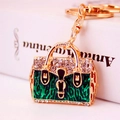 Green handbag keychain charm with gold metal base and sparkling crystal rhinestones - Green