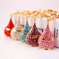 Sparkling crystal rhinestone perfume bottle keychain accessories in various vibrant colors - Random Color