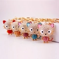 Five assorted crystal cat keychains with rhinestones and gold-plated lobster clasps - Mixed Colors