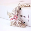 Elegant silver butterfly keychain featuring white pearls and colorful rhinestones - Individual OPP Bag Packaging / Silver
