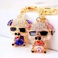 Sparkly rhinestone pig keychain in blue and pink metal with sunglasses for women - Individual OPP Bag Packaging / Random Color