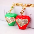 Creative apple keychain with crystal heart design for car charms and bags in red and green - Random Color