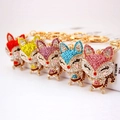 Fünf farbenfrohe Cartoon-Fuchs-Schlüsselanhänger mit Strasssteinen und goldenem Karabiner - 5.5cmx3.7cm / Zufällige Farbe