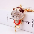 Cute monkey keychain with rhinestones and red enamel coating in gold finish - Red