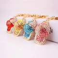 Sparkling rhinestone baseball cap keychains in four colors with golden metal hardware - Random Color