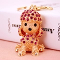Golden poodle keychain with magenta rhinestones and white pearl decorative accent - Fuschia