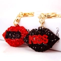 Exquisite red lip keychain with rhinestones and KISS logo on a gold-plated keyring - Random Color