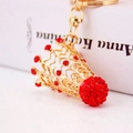 Golden crown keychain pendant with red rhinestones and a crystal encrusted sphere - Single Individual Package / Red