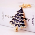 Golden Christmas tree keychain with black enamel, rainbow rhinestones, and spring clasp - Black Christmas Tree