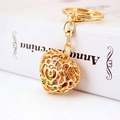 Elegant gold hollow heart keychain with colorful crystals on a minimalist background - Gold with Colorful Rhinestones