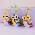 Three colorful rhinestone owl keychains with gold plating for women handbag accessories - Random Color