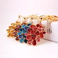 Colorful peacock keychain with rhinestone inlay and gold plating for women handbag - Random Color