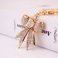 Fonkelende kristallen strik sleutelhanger met gouden letter D voor dames handtassen - Strik Letter D Stijl (YS301)