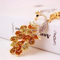 Peacock keychain with colorful crystals and gold metal base for women bags - Gold
