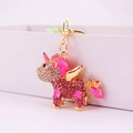 Pink rhinestone unicorn keychain with gold wings and glittery metal accessories - Individual Packaging / Pink