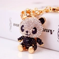 Funkelnder Panda-Schlüsselanhänger mit goldener Krone und Strasssteinen in Schwarz und Weiß - Schwarz
