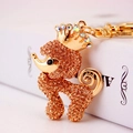 Porte-clés caniche créatif avec couronne et strass ambrés pour accessoire de sac - Pêche