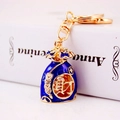 Portachiavi borsa portafortuna in smalto blu con dettagli oro e piccoli cristalli - Blu