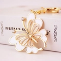 Porte-clés papillon doré avec émail blanc et strass en cristal brillants pour sac - Blanc
