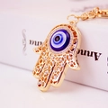 Hamsa Hand Evil Eye keychain in gold metal with blue gemstone and sparkling rhinestones - Single Pack / Evil Eye Style