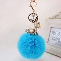 Cute bright blue fur ball keychain with rhinestone donkey doll and gold clasp accessory - Black Ears + Sky Blue