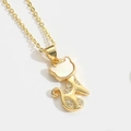 Elegante collana a gatto dorata con testa in madreperla e corpo con zirconi su catena a O - Gatto