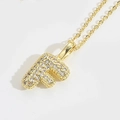 Collier doré avec pendentif lettre F serti de zircons cubiques sur une chaîne fine - Lettre F